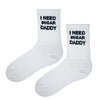  I Need Sugar Daddy Socks are the ultimate conversation starters. With bold black text on crisp white cotton, they’re perfect for those who love humor, irony, or making a statement
