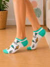 White ankle socks with colorful ice cream cone patterns and mint green heel and toe accents.