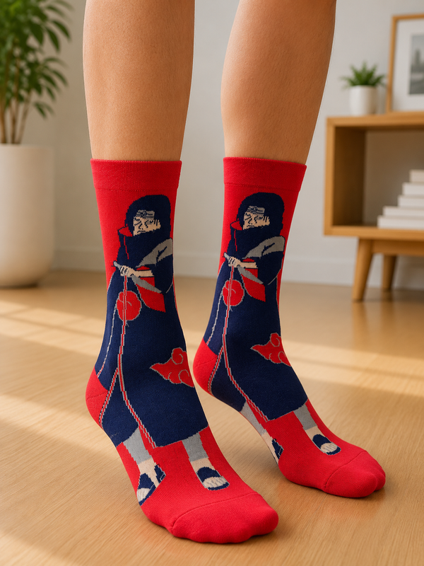 Pair of red crew socks featuring Itachi Uchiha wearing the Akatsuki cloak on a bright red background.