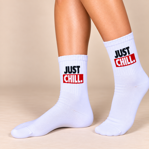 White crew socks with black and red Just Chill slogan