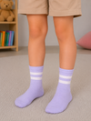 Pastel purple crew socks with white stripes for kids aged 4–6 years.
