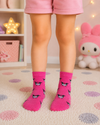 Hot pink Kuromi kids crew socks for children aged 3–4 years featuring an all-over Kuromi character pattern.