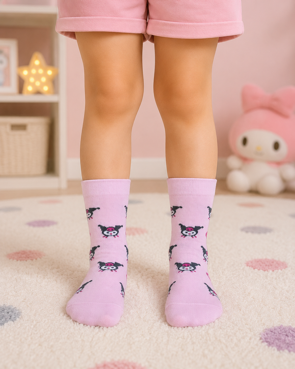Pastel pink Kuromi kids crew socks for children aged 3–4 years featuring an all-over Kuromi pattern.