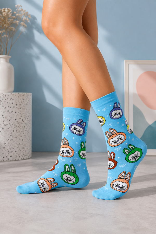 Labubu Face Patterned Socks with colorful character face pattern on a light blue background