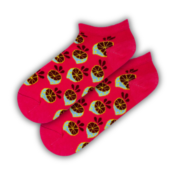 Lemonade Love Ankle Socks! These fun and fruity socks feature lemon slice drinks on a vibrant pink background