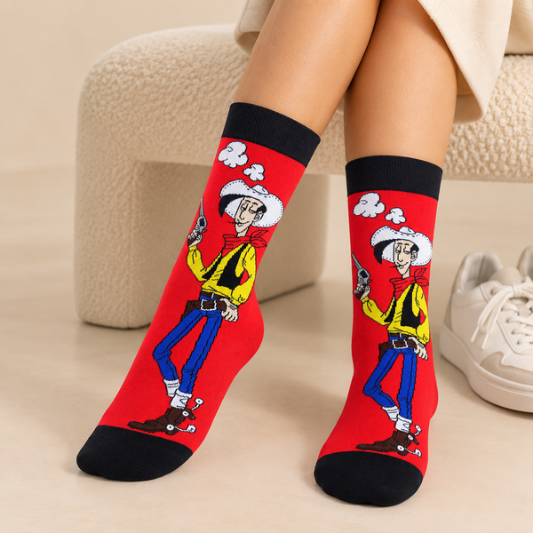 Red crew socks featuring Lucky Luke cowboy character with white hat, yellow shirt, blue jeans and western boots