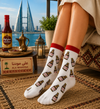 White Mahyawa Bottle Pattern Socks with repeating traditional Mahyawa bottle graphics and red cuff