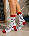 White and red crew socks featuring math formulas, geometry diagrams, and physics equations.