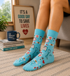 Blue medical pattern socks with healthcare and nurse icon designs