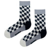 Monochrome Cube Illusion Socks. Featuring a 3D cube pattern in black, grey, and white, these socks add a bold visual twist to any outfit.