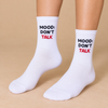 White crew socks with Mood Don’t Talk text in black and red