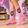 Pink crew socks with retro virtual pet pixel gaming design