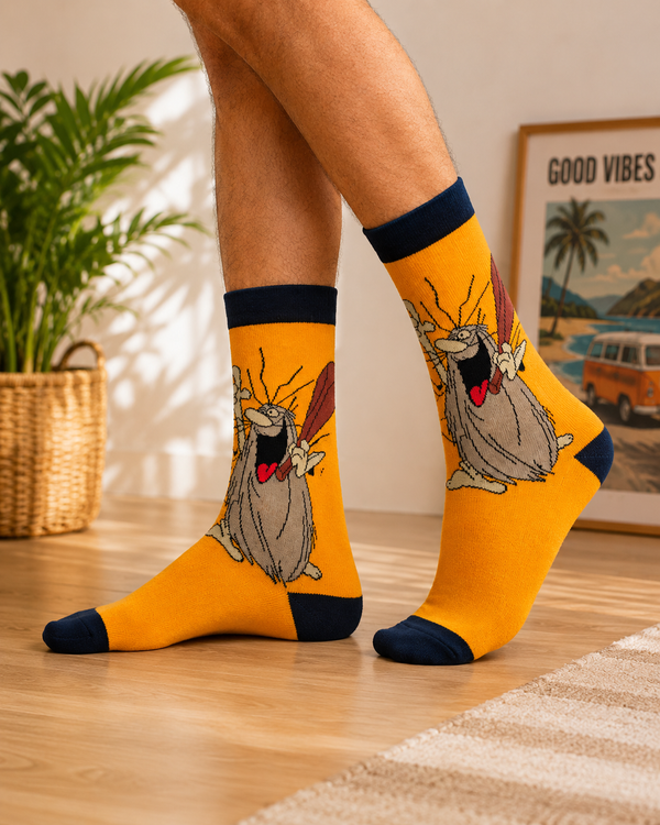 Yellow cartoon caveman crew socks with funny retro animated character design.