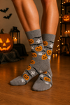 Grey Halloween crew socks with pumpkin, ghost, and bat pattern