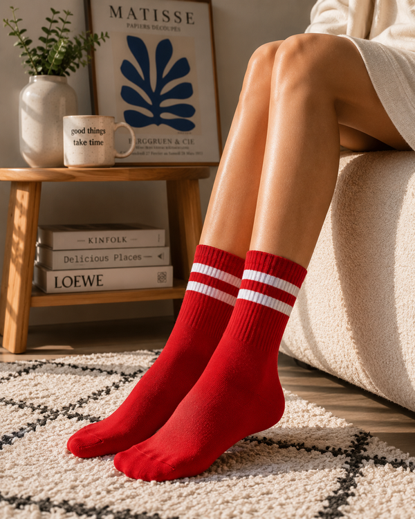 Red crew socks with double white stripe athletic design