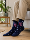 Navy blue crew socks with Rolling Stones-style USA flag tongue graphic and white stars