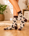 Beige crew socks with brown rooster and chicken pattern and dark brown accents