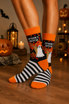 Black and orange Halloween crew socks with ghost, pumpkin, spooky tree, and striped design