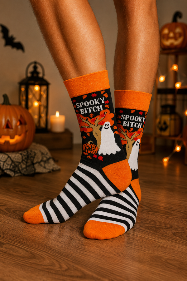 Black and orange Halloween crew socks with ghost, pumpkin, spooky tree, and striped design