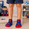 Blue Superman logo ankle socks with red cuffs and toes for kids aged 6–7 years