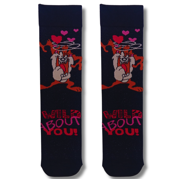 Black crew socks featuring Taz the Tasmanian Devil with hearts and the phrase "Wild About You!" from Looney Tunes.
