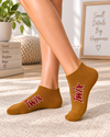 Caramel brown Twix ankle socks with red and white logo design