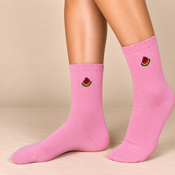 Pink crew socks with small embroidered watermelon slice