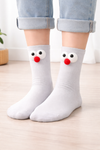 White crew socks with fluffy googly eye cartoon design for unisex casual wear