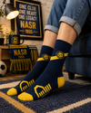Navy blue and yellow football-inspired crew socks with athletic stadium graphics and sporty detailing.