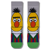 Front view of Bert inspired cartoon crew socks with colorful character design on a clean background.