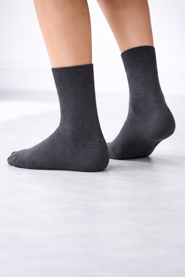 Dark charcoal plain crew socks with a small stitched detail, unisex breathable socks fits EU 35 to 45