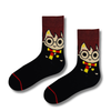 Black and dark red crew socks featuring a cute wizard-inspired cartoon character with round glasses and a red-yellow striped scarf in a magical-themed minimalist design.