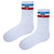 White crew socks with blue and red stripes and 'Let's Fly Up' text